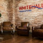 3 chairs with Whitehall logo on the wall